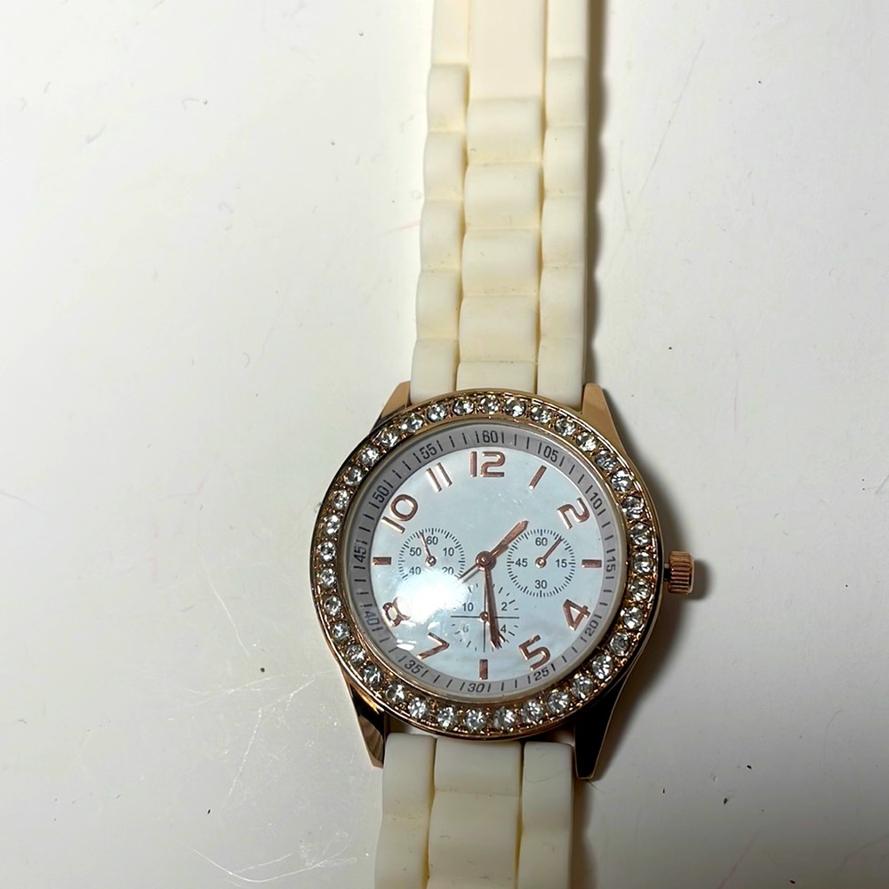 White and gold watch by Darice